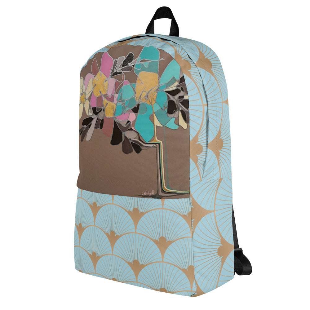 backpack in light teal and gold with blue and pink dripping flowers