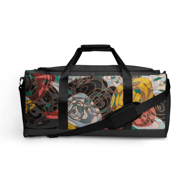 Duffle bag in black with overlapping ovals in red, yellow, black and white