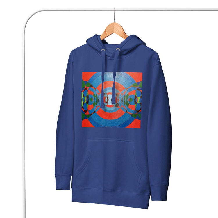 A blue sweatshirt on a hanger with a design in red, black, blue, and green circles.