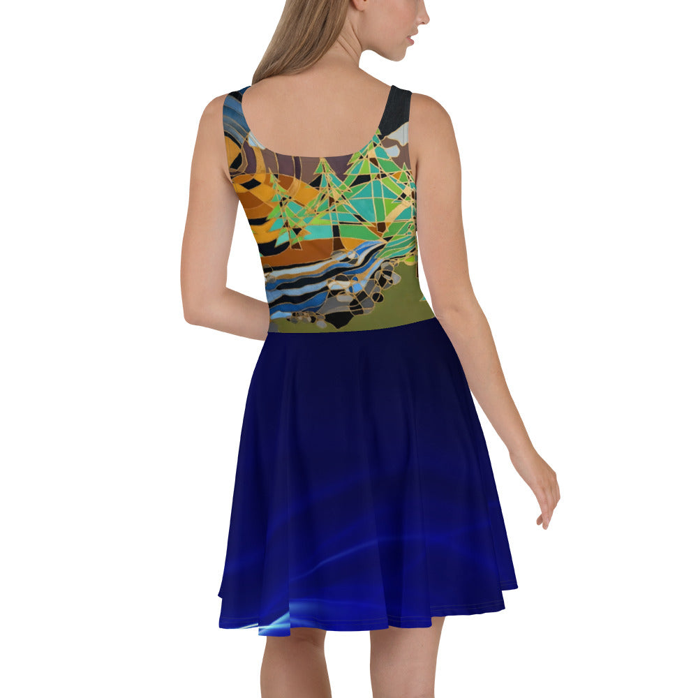 A skater dress with a blue water skirt and river, mountain abstract art on top